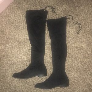Thigh high flat boots